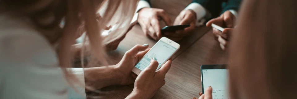 People chatting on phones engaged