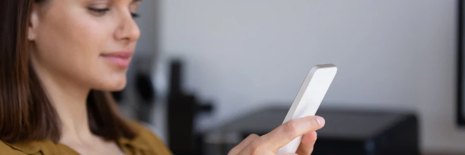 girl tapping on her phone